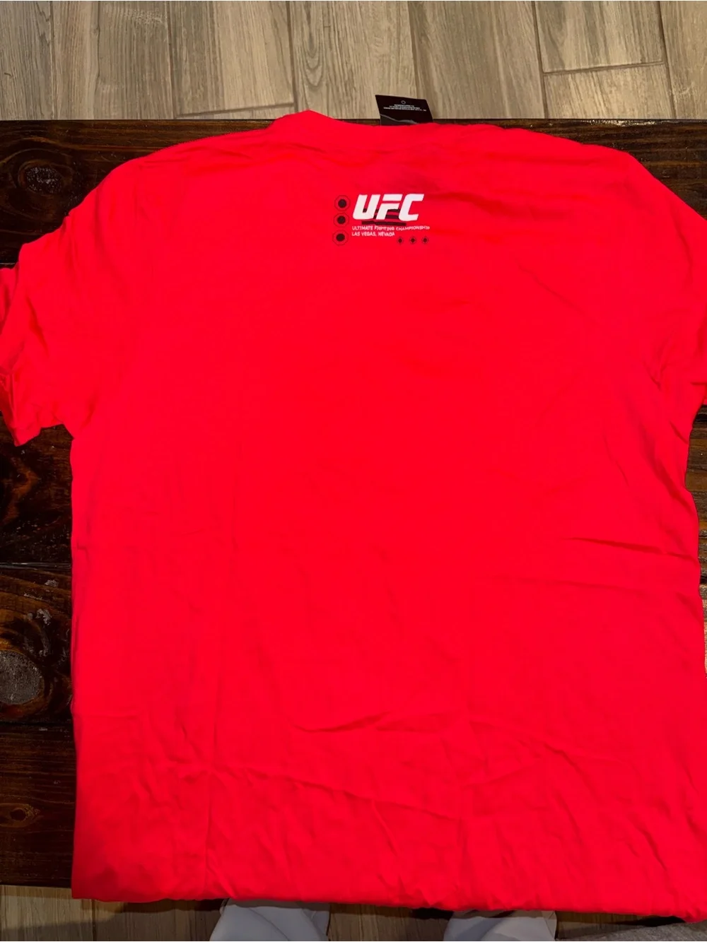 UFC Official Las Vegas cotton graphic t-shirt with white UFC Cage
